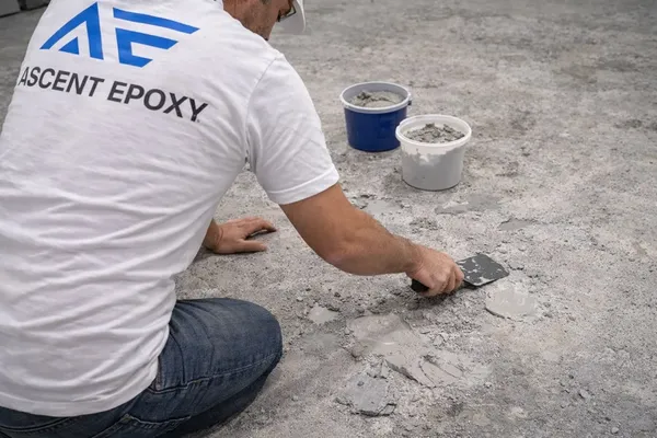 Grinding and preparing concrete after coating removal in Baton Rouge